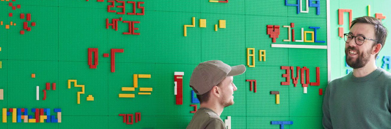 Two professionals collaborating in a diverse and inclusive workplace, representing the Adecco Group’s commitment to DE&I and workplace equity. Two professionals collaborating in a diverse and inclusive workplace, representing the Adecco Group’s commitment to DE&I and workplace equity.